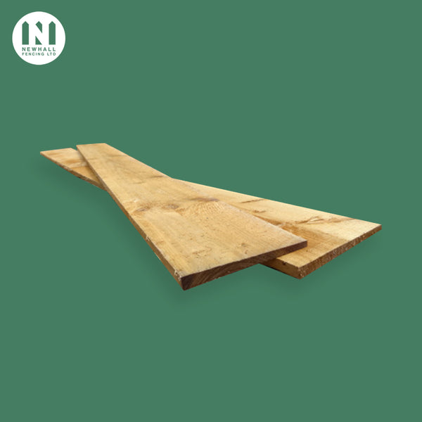 Pressure treated feather edge fencing boards
